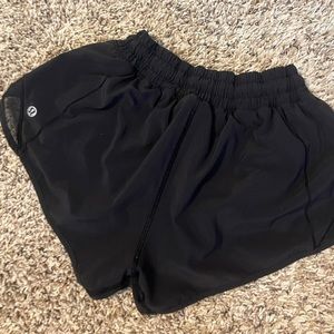 SOLD black basically new Lululemon hotty hot shorts size 4 2.5”